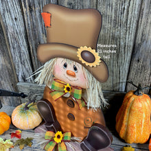 Load image into Gallery viewer, Scarecrow, Pumpkin centerpiece, Fall wood decor, Thanksgiving porch decor, Primitive Scarecrow on pumpkin sign, Fall arrangement, Halloween
