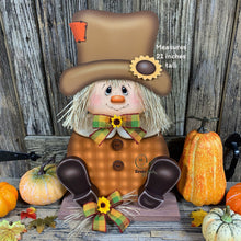 Load image into Gallery viewer, Scarecrow, Pumpkin centerpiece, Fall wood decor, Thanksgiving porch decor, Primitive Scarecrow on pumpkin sign, Fall arrangement, Halloween
